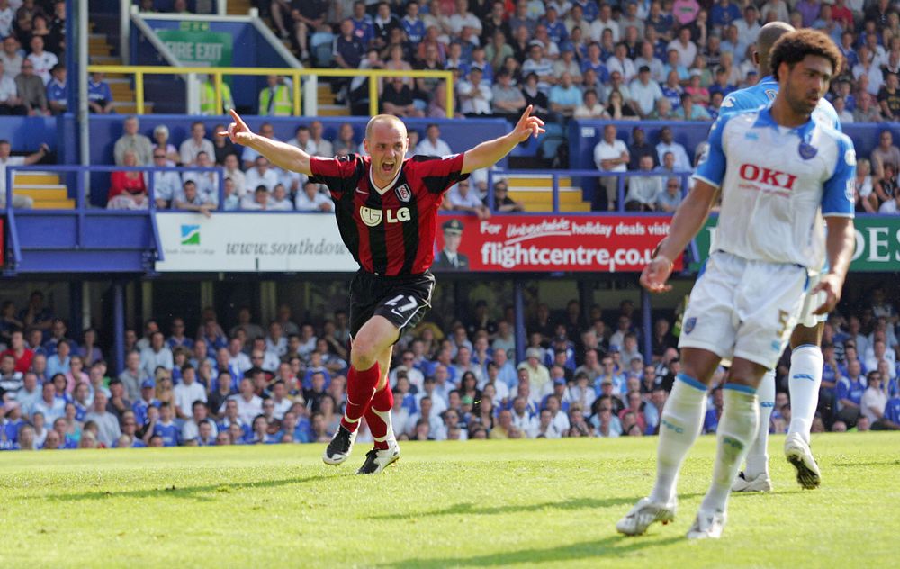 Danny Murphy celebrates after scoring the winner at Portsmouth to retain Fulham's Premier League status