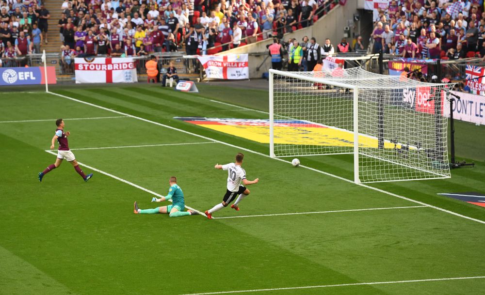 Tom Cairney scores the winning goal in the 2018 Play-Off Final