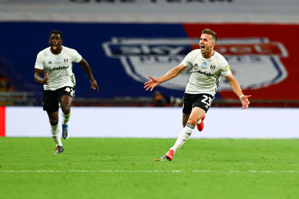 Joe Bryan celebrates scoring the opening goal in the 2020 Championship Play-Off Final