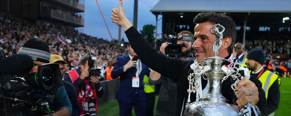 Marco Silva celebrates with the Championship trophy