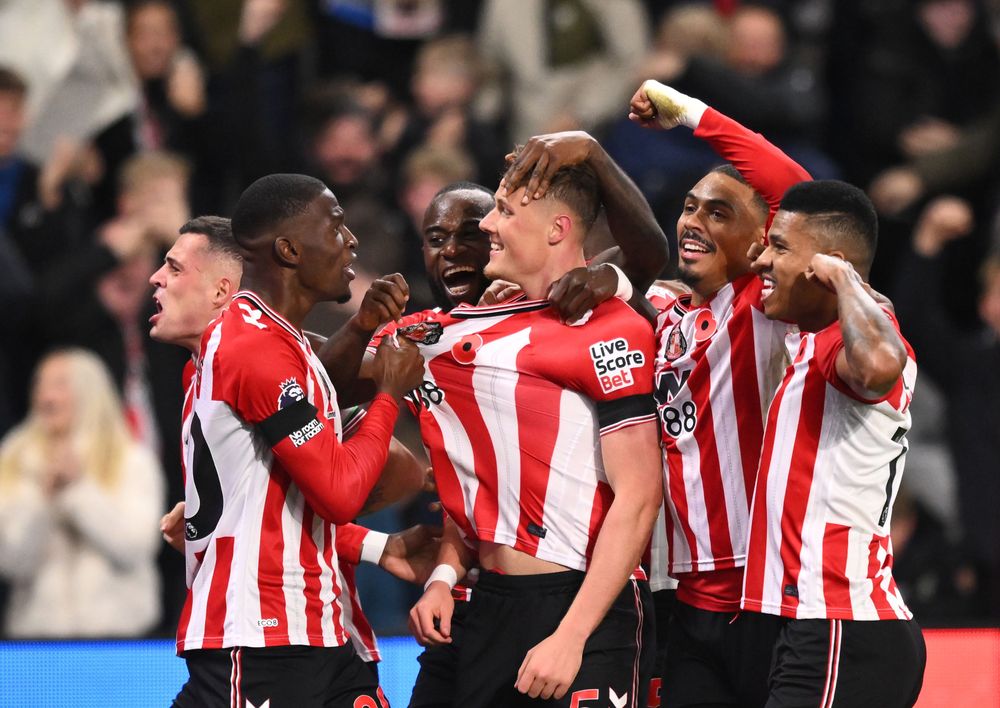 Dan Ballard celebrates scoring against Arsenal